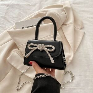 Elegant Black Handbag with Silver Accents